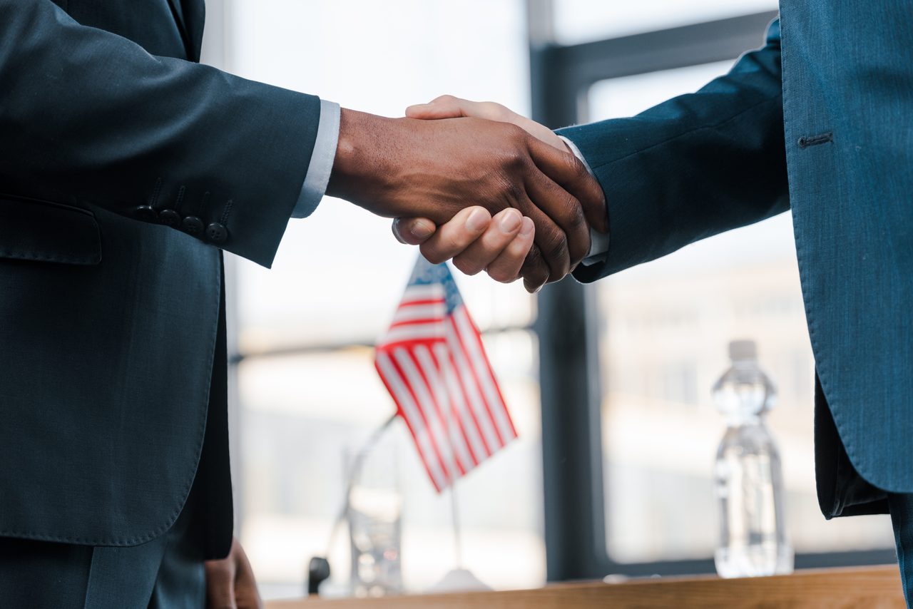 Business professionals shaking hands