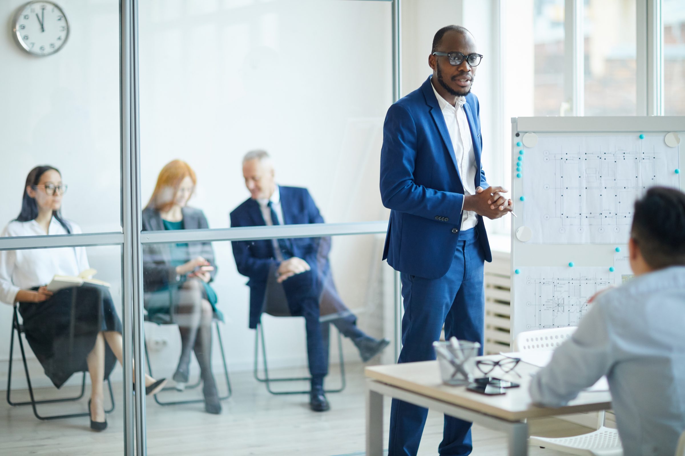 A business leader presenting strategy to colleagues