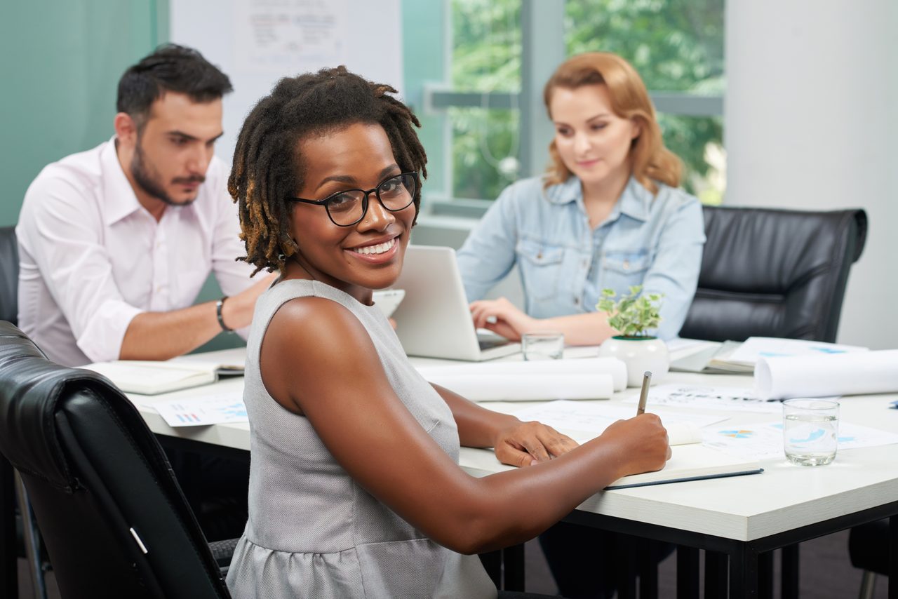Professionals collaborating in a bright office